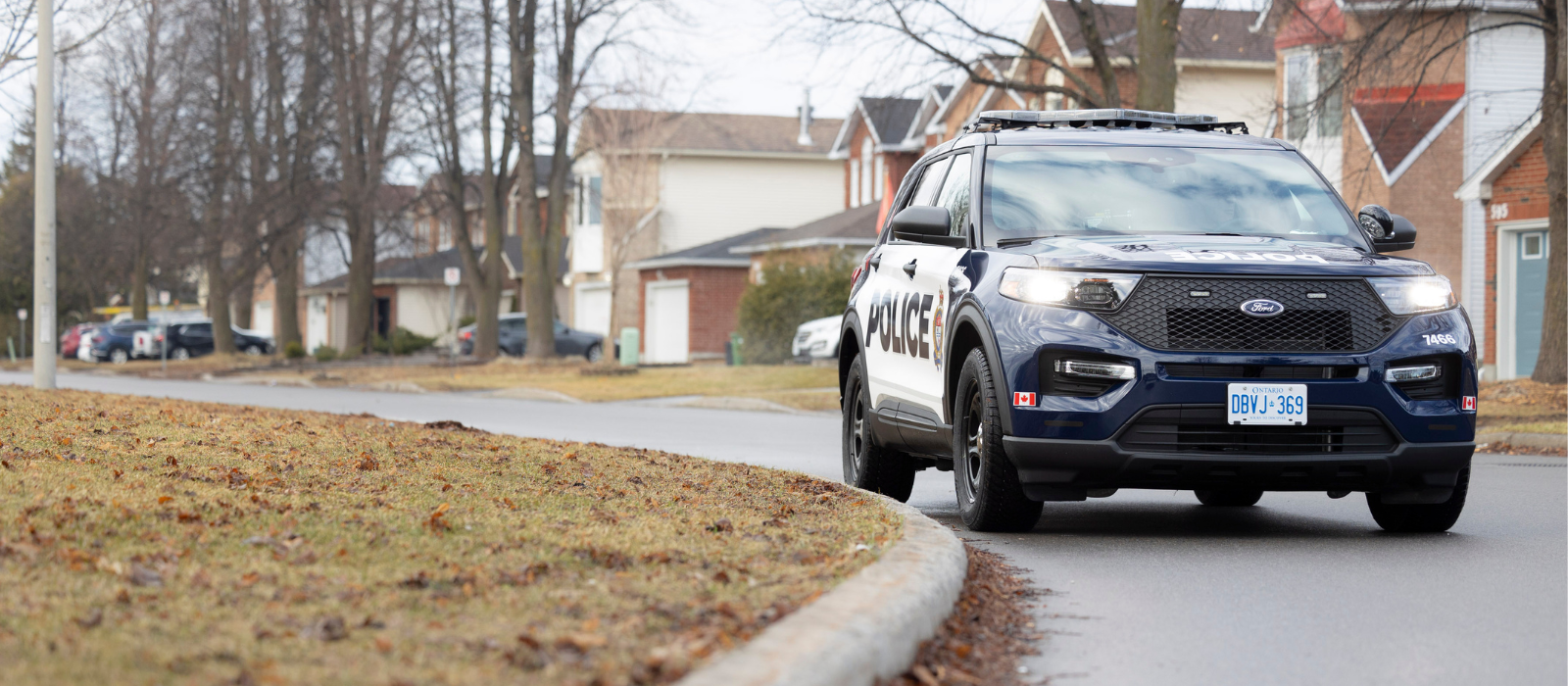 Police cruiser parked in neighbourhood